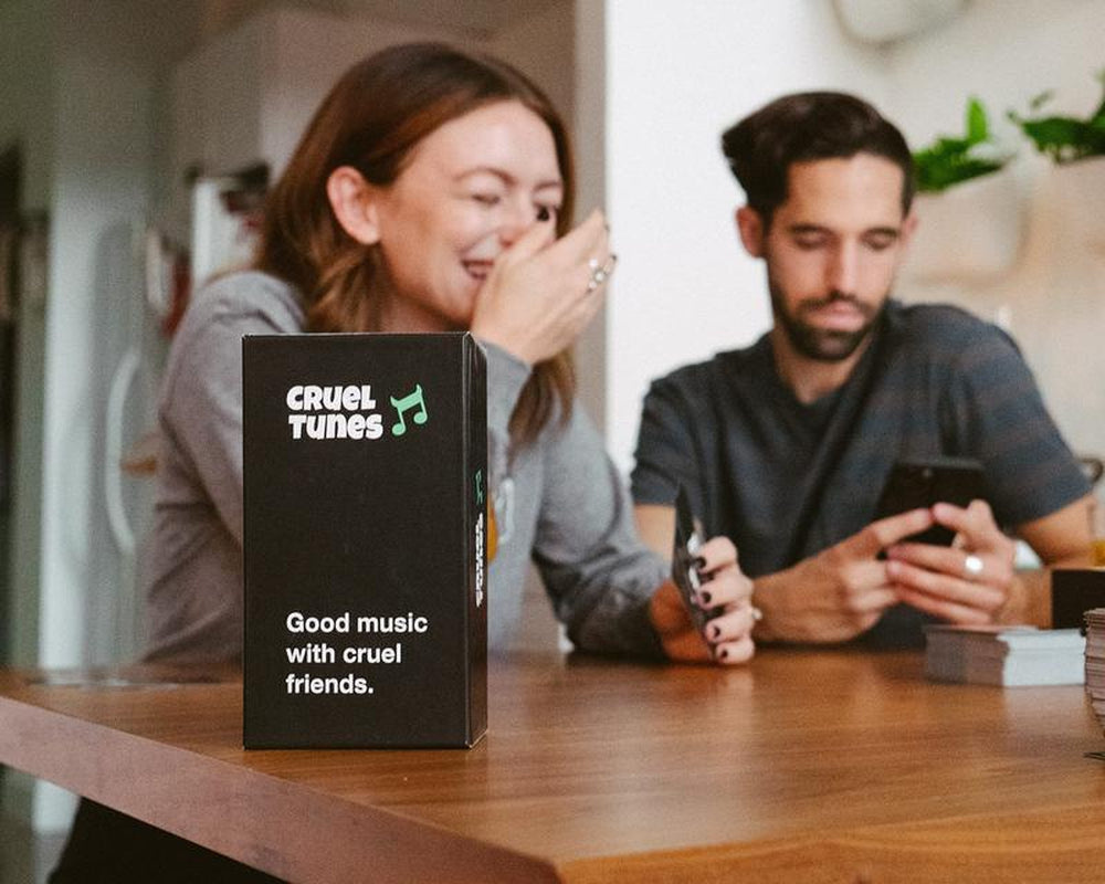 Cruel Tunes - the Hilarious Adult Party Game for Music Lovers| Fun Game for Pregames, Game Nights, and Drinking Games| Card Games, Board Games, Tabletop Games